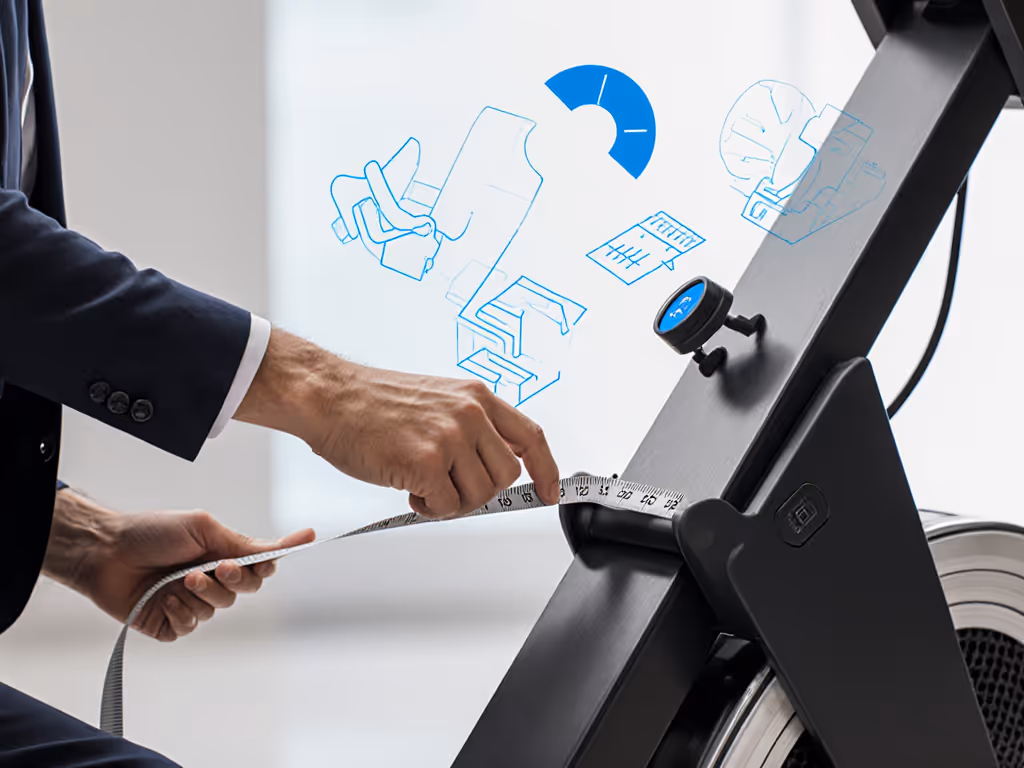 ergonomics_testing_with_mobility_specialist_showing_rail_height_measurements